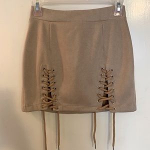 Tan laced mini skirt